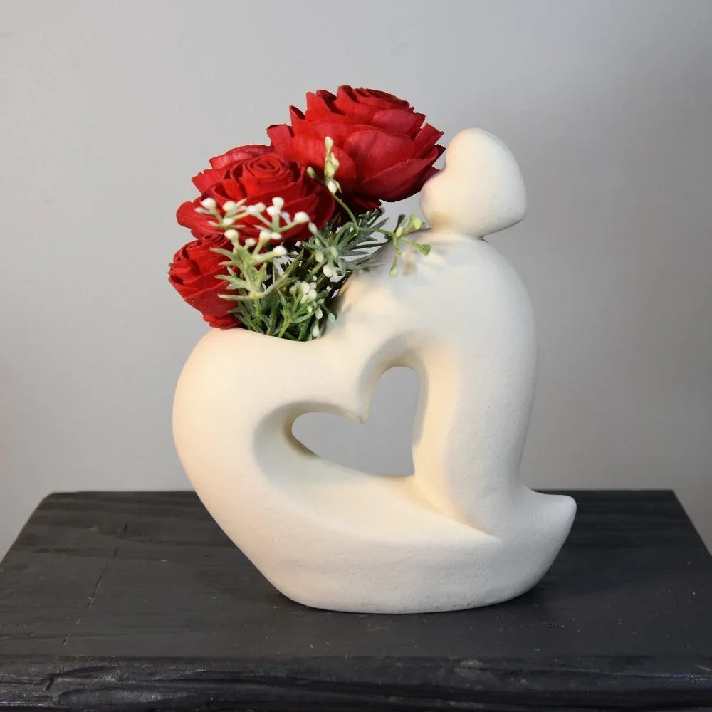 Sexy white curvy hearts vase with 4 red Sola wood roses that will last forever!